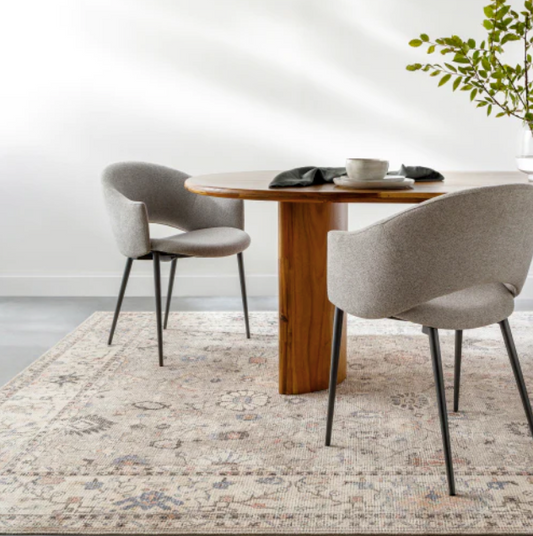 A perfectly sized rug under a dining room table