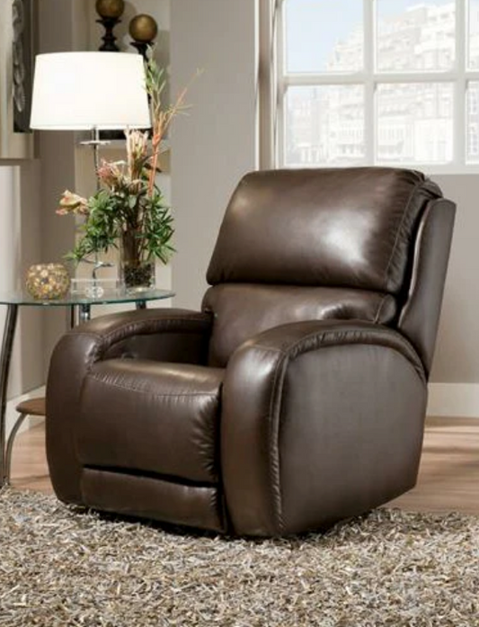A brown massage recliner next to a side table