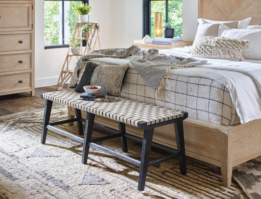 A cozy bedroom retreat with a light brown bedroom set