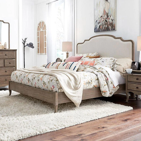 A beautiful white and wood upholstered bed frame