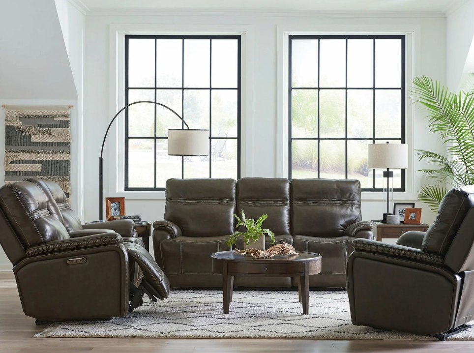 A couch and two recliners
