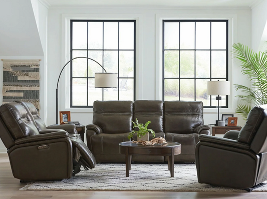 A couch and two recliners
