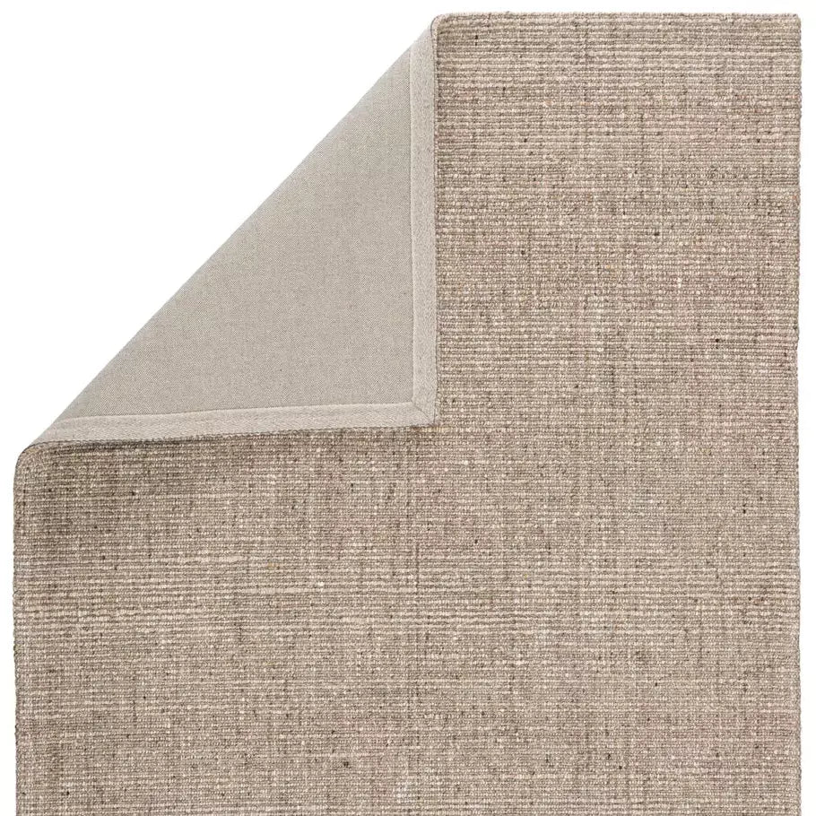 Jaipur Living Sutton Natural Solid Tan/ Black Rug - Chapin Furniture